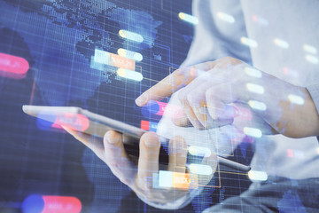 Multi exposure of man's hand holding and using a digital device and data theme drawing. Innovation concept.