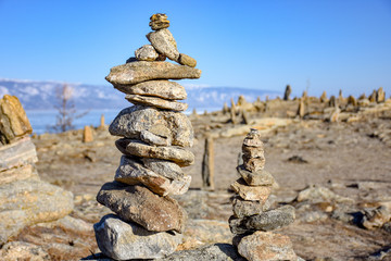 Fototapeta na wymiar Shaman rocks at Lake Baikal in winter, Siberia 