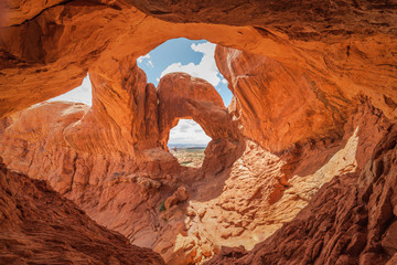 Stunning Double Arch located in Arches National Park, Utah, USA during summer time with prisitne...