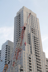 Fototapeta na wymiar Construction Crane - Building Downtown, Achitecture