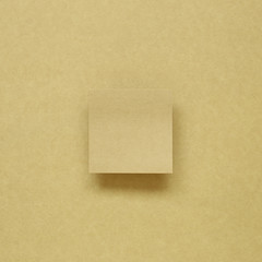 Kraft memo paper, sticky notes on kraft background. top view, copy space