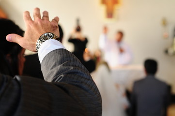 businessman with arms raised