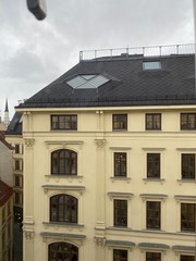 Fototapeta na wymiar old building, tenement, apartment house, yellow facade, dormer window