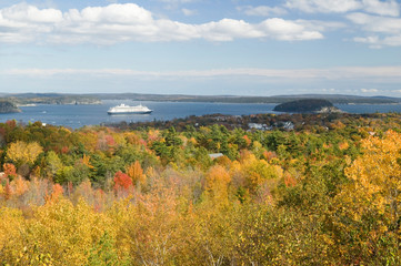 Autumn view from 1530 foot high Cadillac Mountain with views of the Porcupine Islands, Frenchman Bay and Holland America cruise ship in harbor, Acadia national Park, Maine