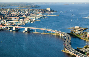 Aerial of downtown Portland, Maine showing Maine Medical Center, Commercial street, Old Port, Back Bay and the Casco Bay Bridge from South Portland
