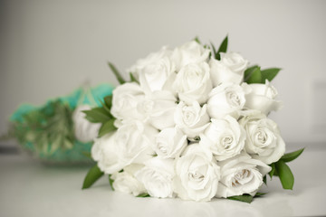Beautiful white roses wedding bouquet