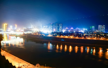 Fototapeta na wymiar Night view of city by jinsha river