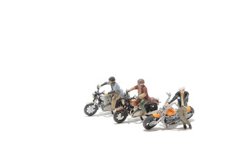 the group of figure ride the motorcycle