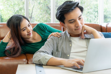 Young couple use credit card for online shopping