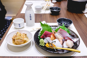 Fish, seafood and sake at restaurant in Kyoto, Japan