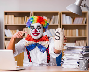 Clown businessman working in the office