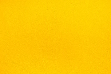 Obraz premium Abstract yellow concrete texture background.Orange color cement wall texture for interior design.copy space for add text.
