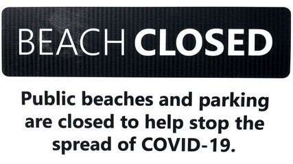 Coronavirus or COVID-19 Beach closed road sign. Warning of virus.