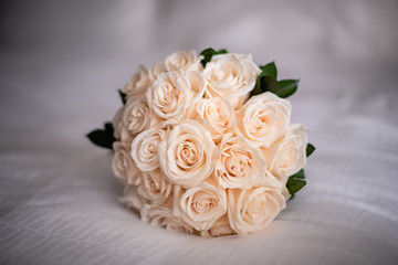 Beautiful white roses wedding bouquet