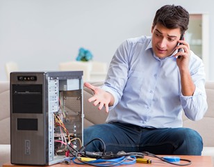 Angry customer trying to repair computer with phone support