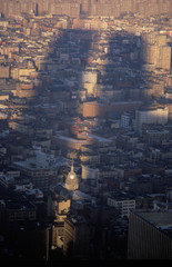 Shadows of World Trade Towers over New York City, NY