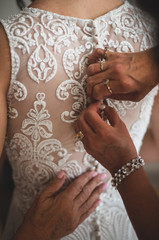 Obraz premium Close up of a wedding dress or bridal gown which is the dress worn by the bride during a wedding ceremony.