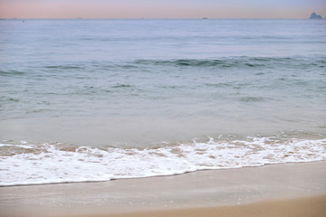 Soft Waves on a Calm Beach
