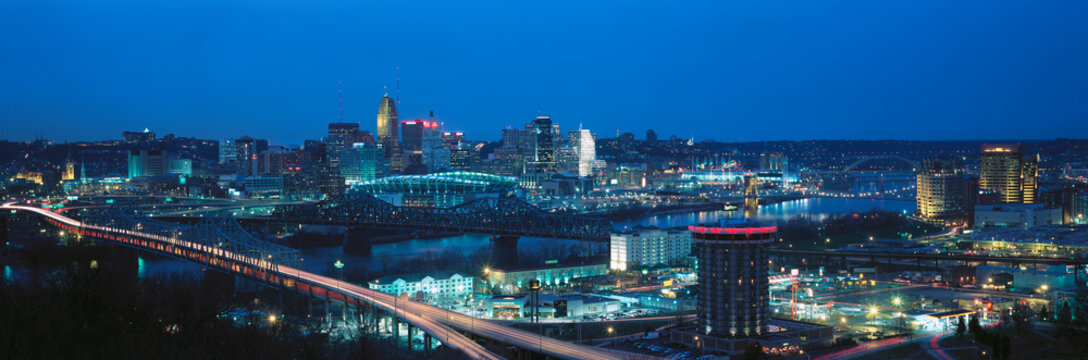 Panoramic night shot of Cincinnati skyline and lights, Ohio and Ohio River as seen from Covington, KY