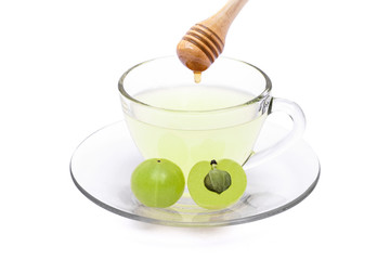 Gooseberry juice isolated on white.