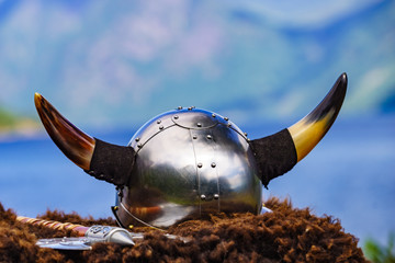Viking helmet on fjord shore, Norway