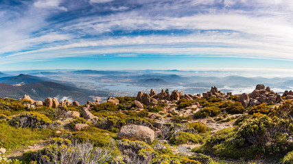 Ealry morning dawn panormic view over greater Hobart and the wilderness from Mount Wellington, Hobart, Tasmania.