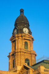 Fototapeta na wymiar Clock Tower of historic courthouse in morning light, Ft. Worth, TX