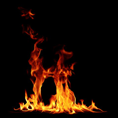 Fototapeta na wymiar Fire burning flames on a black background