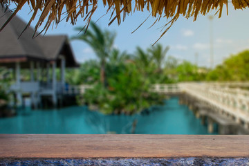 display products on the table, background, beside the pool and water pavilion