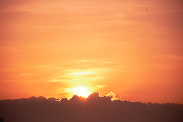 The orange evening sky and the sun set