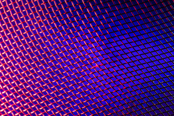 Macro image, blue lit light, metal mesh