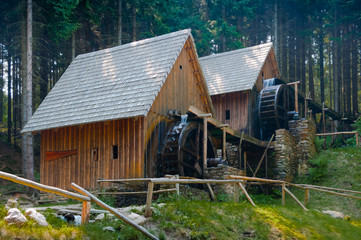 Replica of an old iron-mill. The iron-mill is a steel and blacksmith's workshop equipped with a water-driven forging machine.