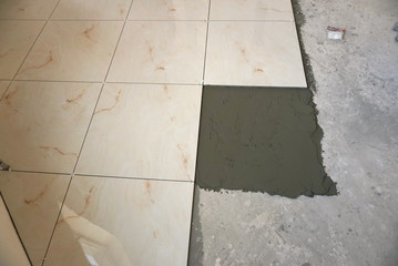 Fototapeta premium Ceramic Tiles. Floor Tiles Installation