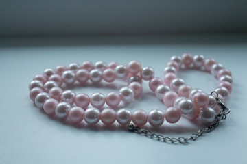 pearl necklace on white background