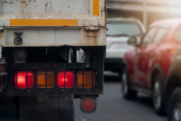 Brake light of truck car on the road  with many cars. Stop by traffic light condition.