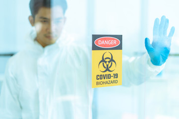 Stop Corona viruses or COVID-19. Biohazard sign or symbol in laboratory.