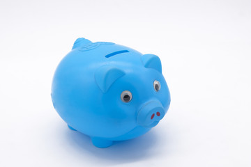Blue piggy bank or money box isolated on a white background