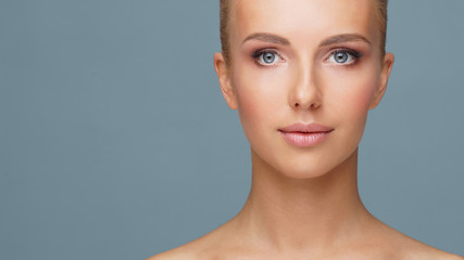 Beautiful face of young and healthy woman. Skin care, cosmetics, makeup, complexion and face...
