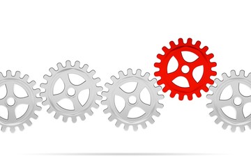 Row of metal cogwheel gears with a central red wheel over white background, teamwork, connection or communiaction abstract concept