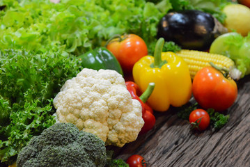 Mixed Vegetables and Salads on wooden Background.Select focus on cauliflower.