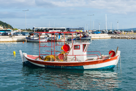 Katakolon, Greece - October 31, 2017: Traditional colorful wooden fishing boats in harbor of the Katakolon (Olimpia), Greece.