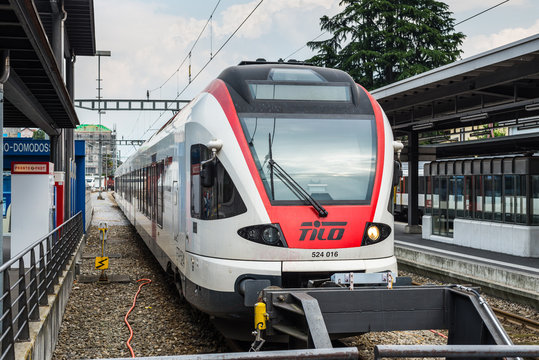 Locarno, Switzerland - May 28, 2016: A passenger train of the TILO (Regional Train Ticino Lombardia) at a platform of the Locarno railway station.