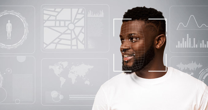 Personal info collection. Facial recognition of African American guy on grey background with digital data, blank space