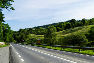 Road over the hills. Landscape of the road over the hills in Prislop county, Bistrita-Nasaud, Romania.