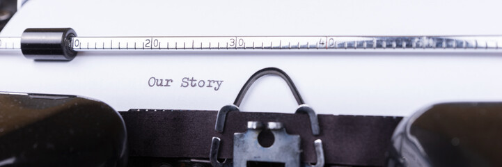 Our story written on an old typewriter. Concept for unique, individual or personal life history...
