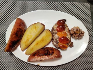 Baked potato halves with meat
