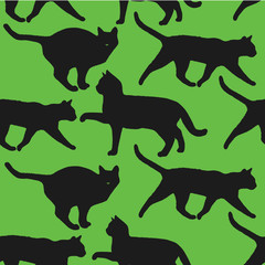 Silhouettes of cats. Black and green seamless pattern