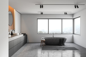 White and wooden bathroom with stone tub