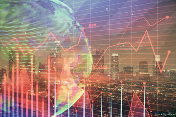 Forex chart on cityscape with tall buildings background multi exposure. Financial research concept.