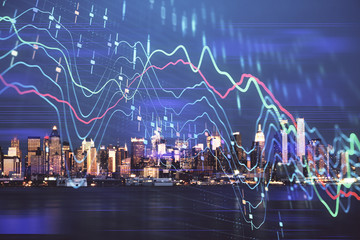 Financial graph on night city scape with tall buildings background double exposure. Analysis concept.